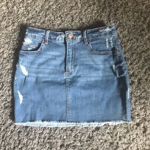 Distress denim mini skirt in size M